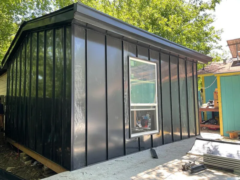 Black standing seam metal wall panels for Metal Roof Installation in Vergennes