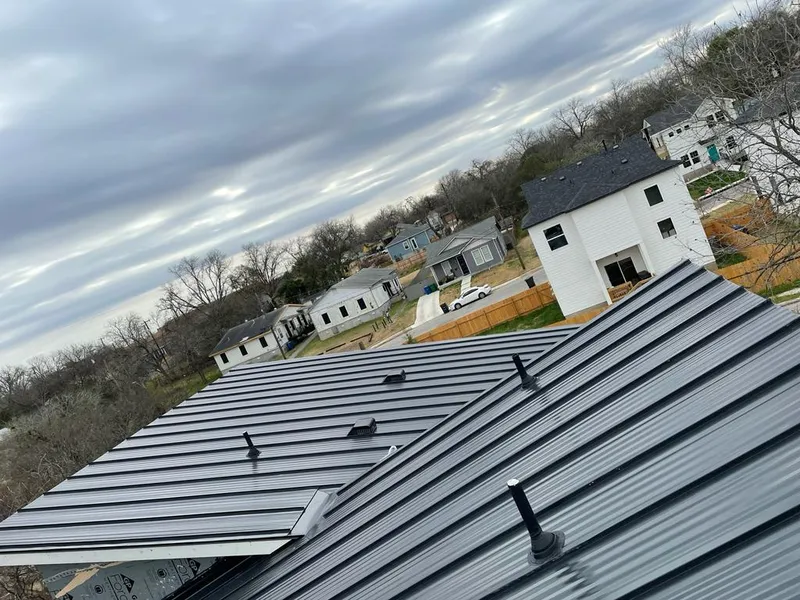 Standing seam metal roof panels with vents for Skylight Repair in Vergennes